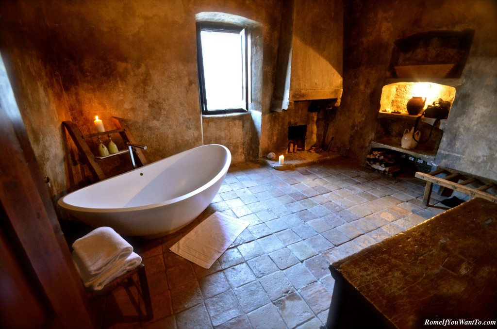 The room of my dreams, y'all. Huge tub, fireplace, heated stone floors, mountain views.