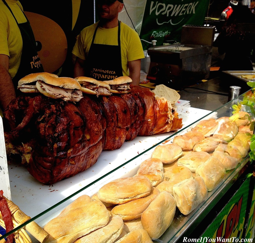 Porchetta is just what it looks like. A giant roast pig (stuffed with herbs, and a typical dish of Tuscany/Lazio).